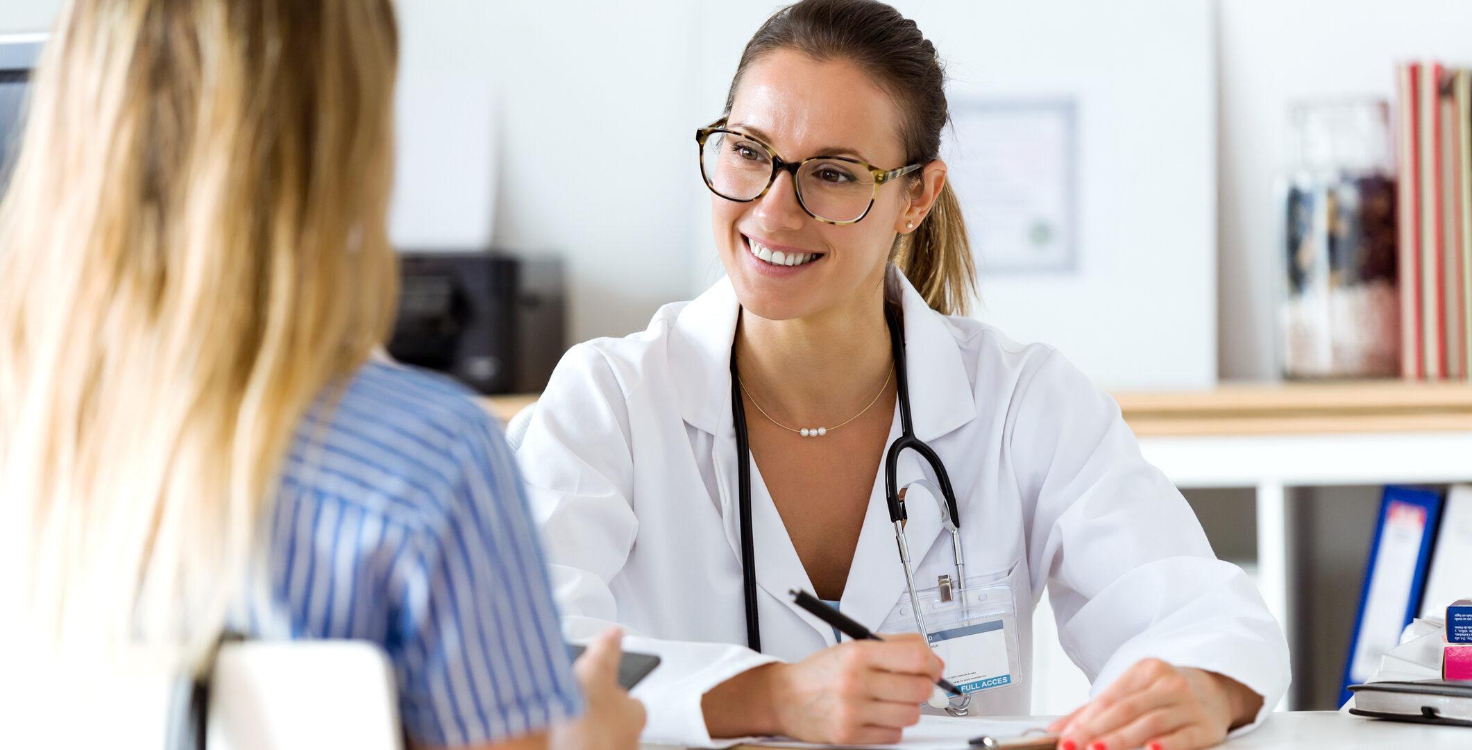 Portrait of female doctor explaining diagnosis to her patient.